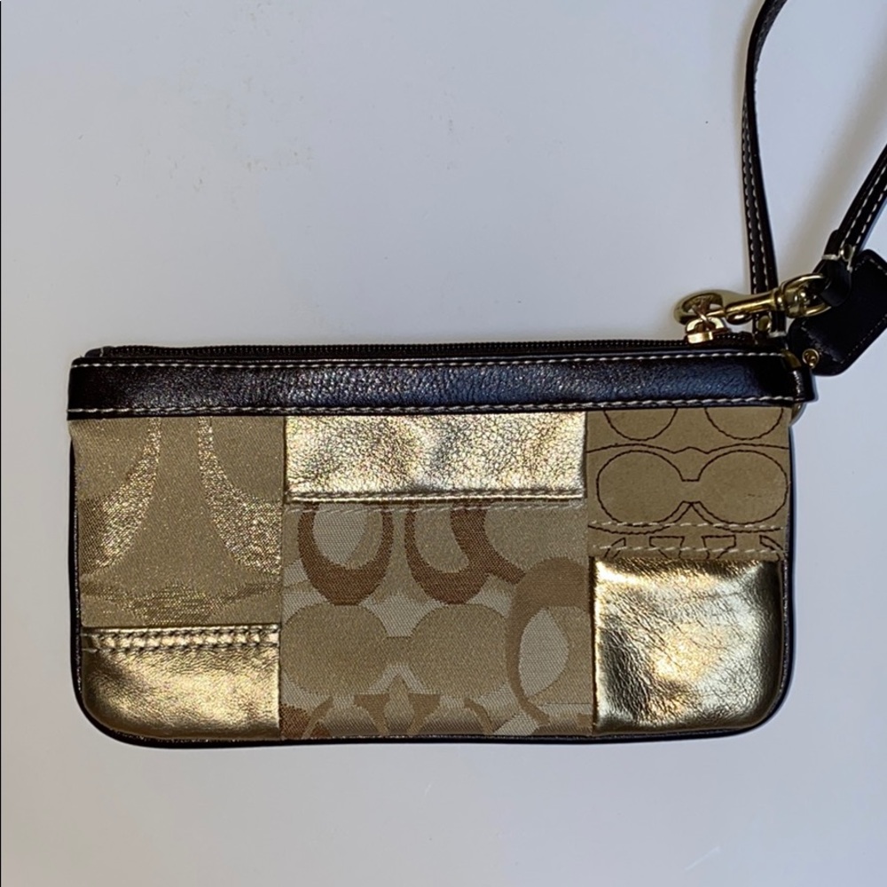 Coach gold wristlet